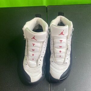 White and Black Sneakers with Red Accents